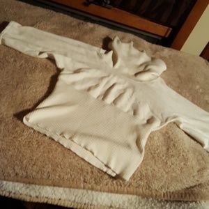 Cream turtle neck sweater.